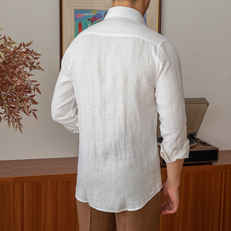 Back view of men's white linen shirt showing clean shoulder shaping