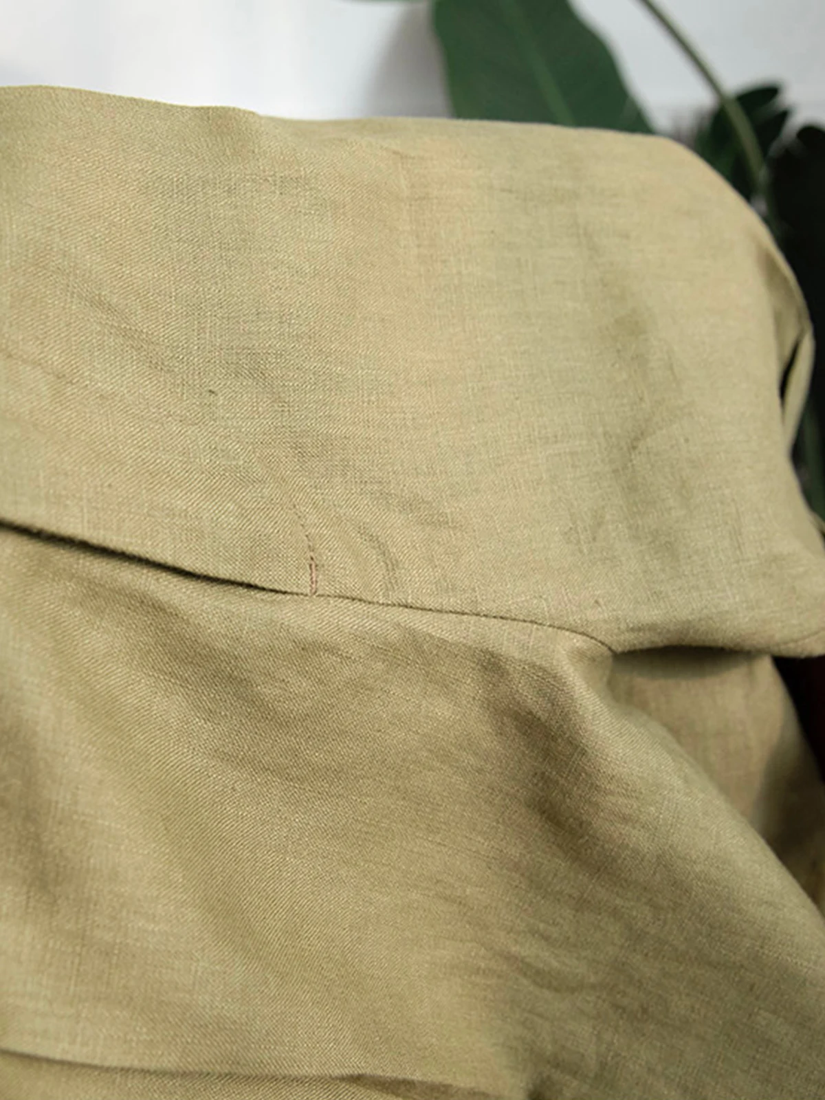 Men's Summer Breathable Casual Linen Shorts 4 Close-up of 100 percent linen fabric texture on army green shorts